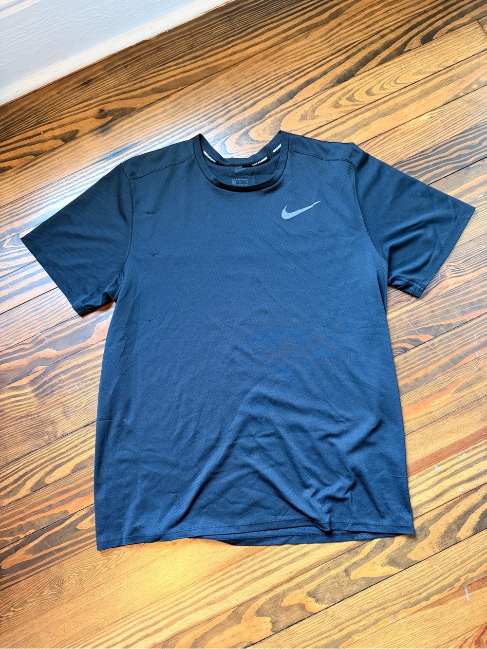 Nike Black Short-Sleeve Athletic Tee with Reflective Swoosh